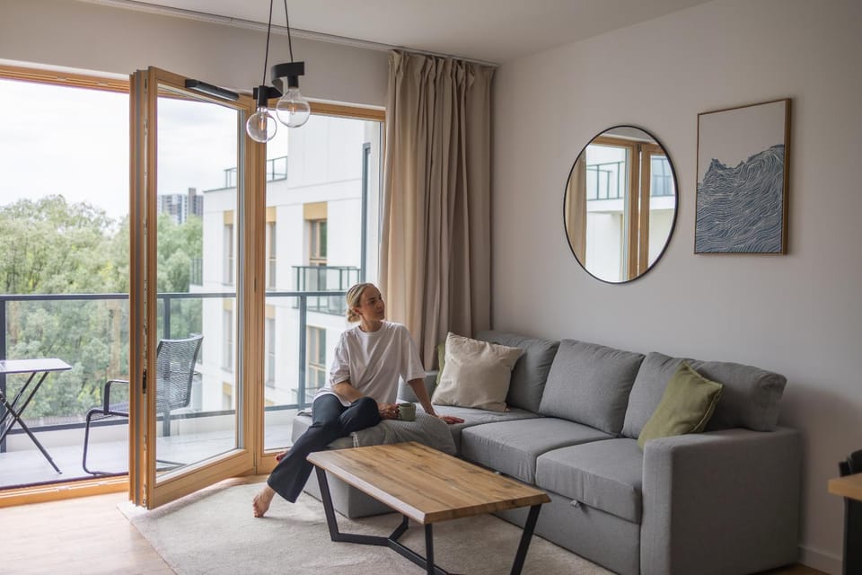 People, View (from property/room), Balcony/Terrace, Living room, Seating area, group of guests