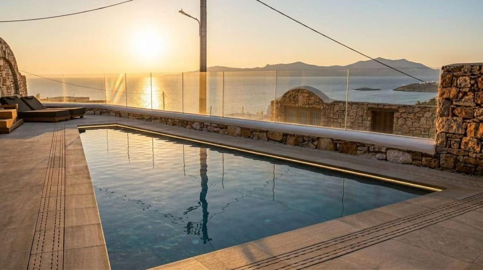 Property building, Natural landscape, Pool view, Sea view, Swimming pool, Sunset
