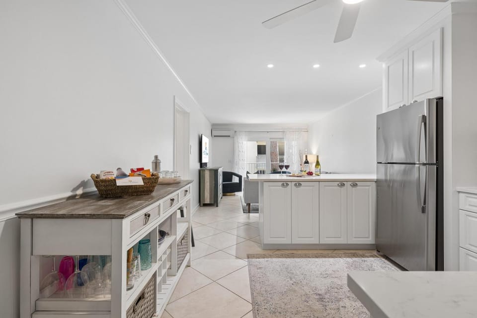 Kitchen or kitchenette, dishwasher, oven, stove