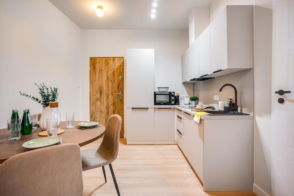 Elegancki Apartament z miejscem do Pracy obok MTP Apartment in Poznan