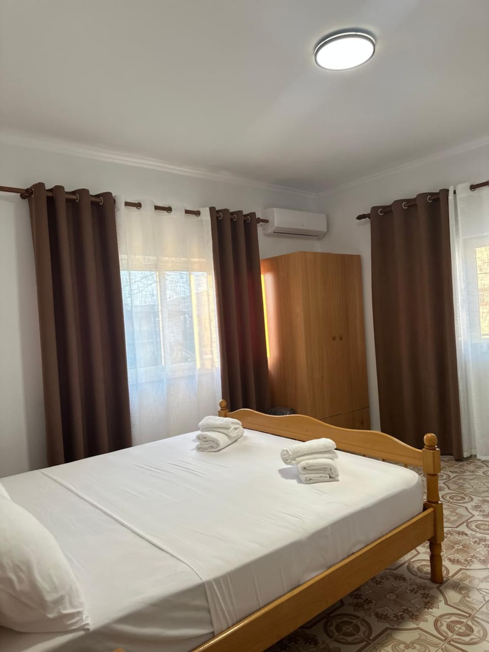 Bed, Bedroom, towels, wardrobe, air conditioner