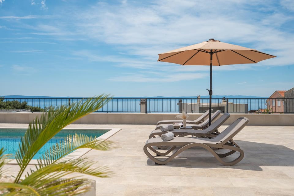 Patio, Day, Natural landscape, Pool view, Sea view, Swimming pool, sunbed