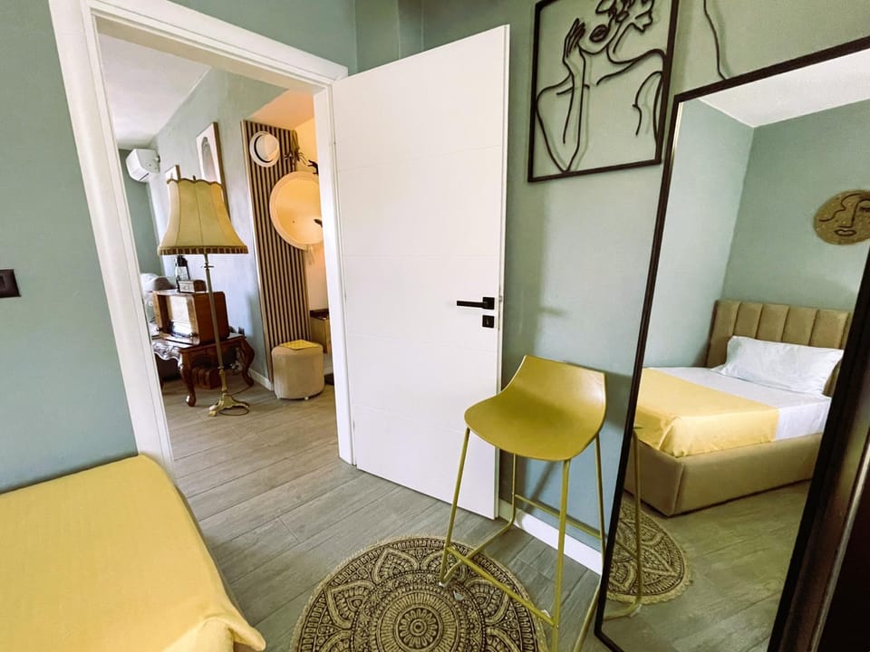Bed, Living room, Seating area, wardrobe