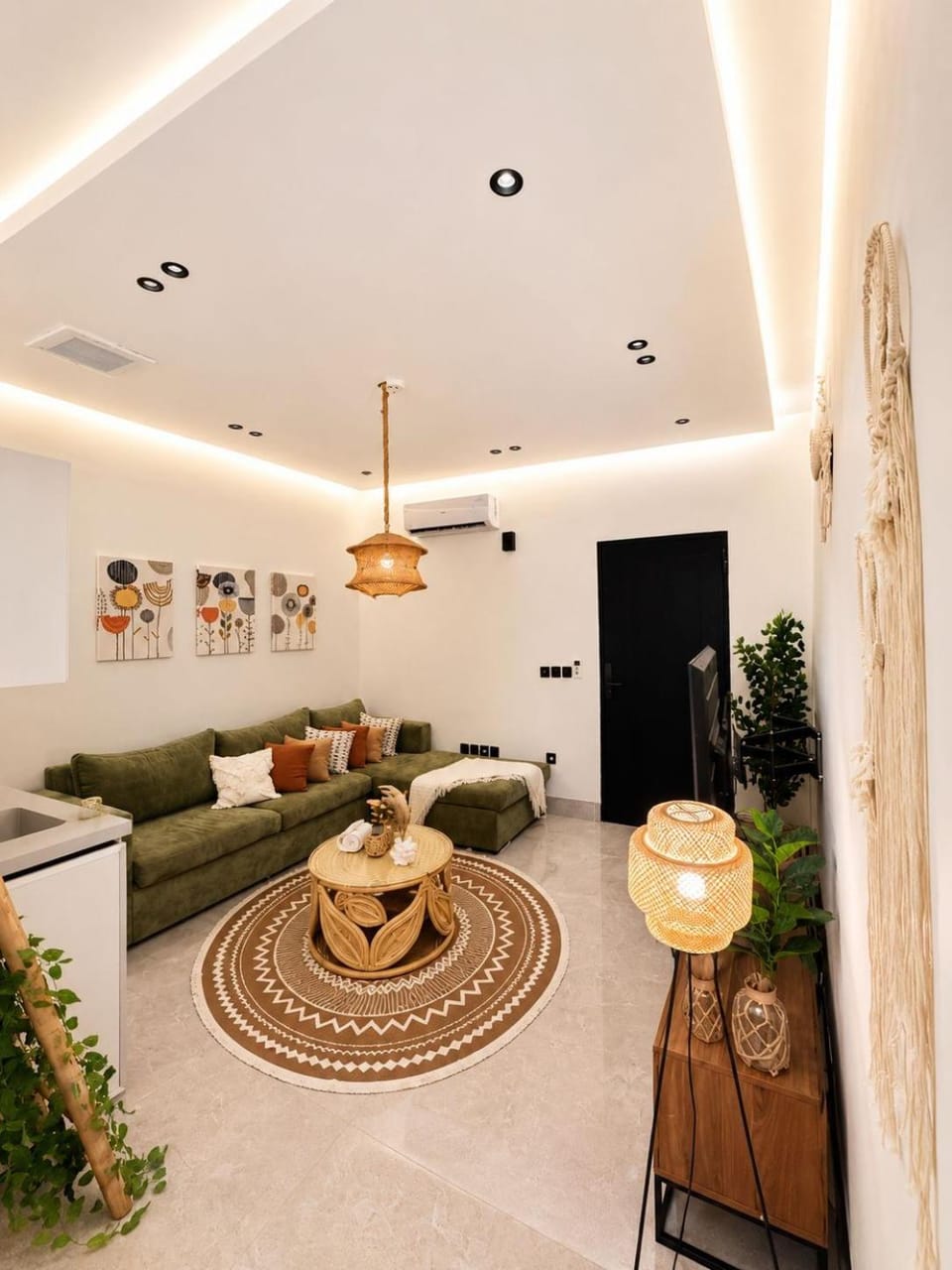 One bedroom and a living room with a bohemian style Apartment in Riyadh