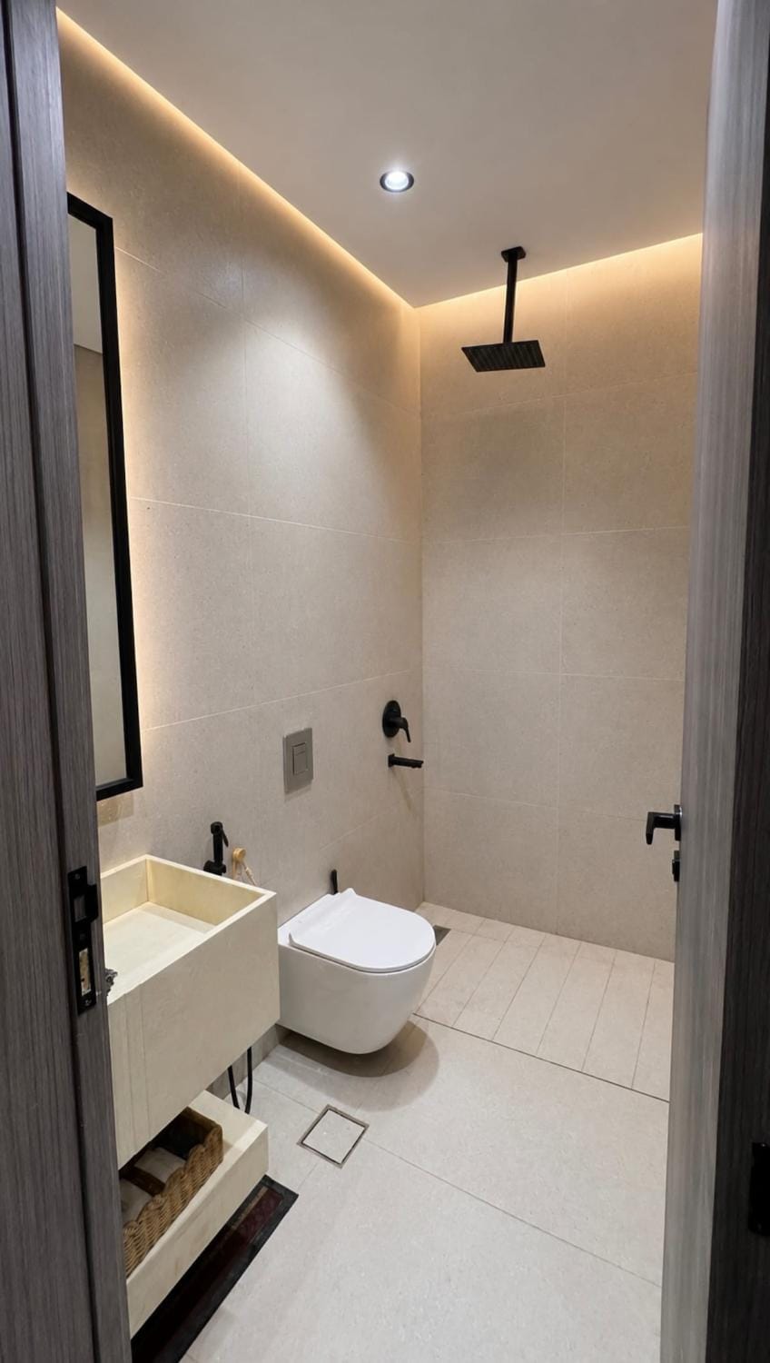 One bedroom and a living room with a bohemian style Apartment in Riyadh