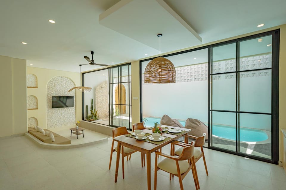 Living room, Seating area, Dining area, Pool view