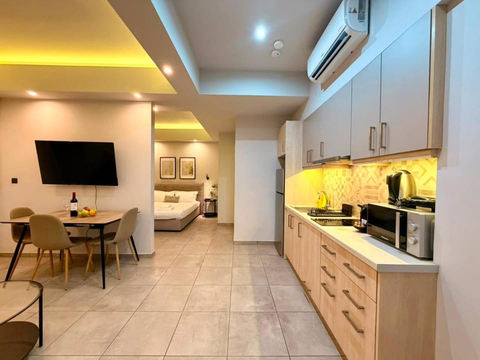 Bed, TV and multimedia, Kitchen or kitchenette, Living room, Photo of the whole room, Seating area, Dining area, Bedroom, stove