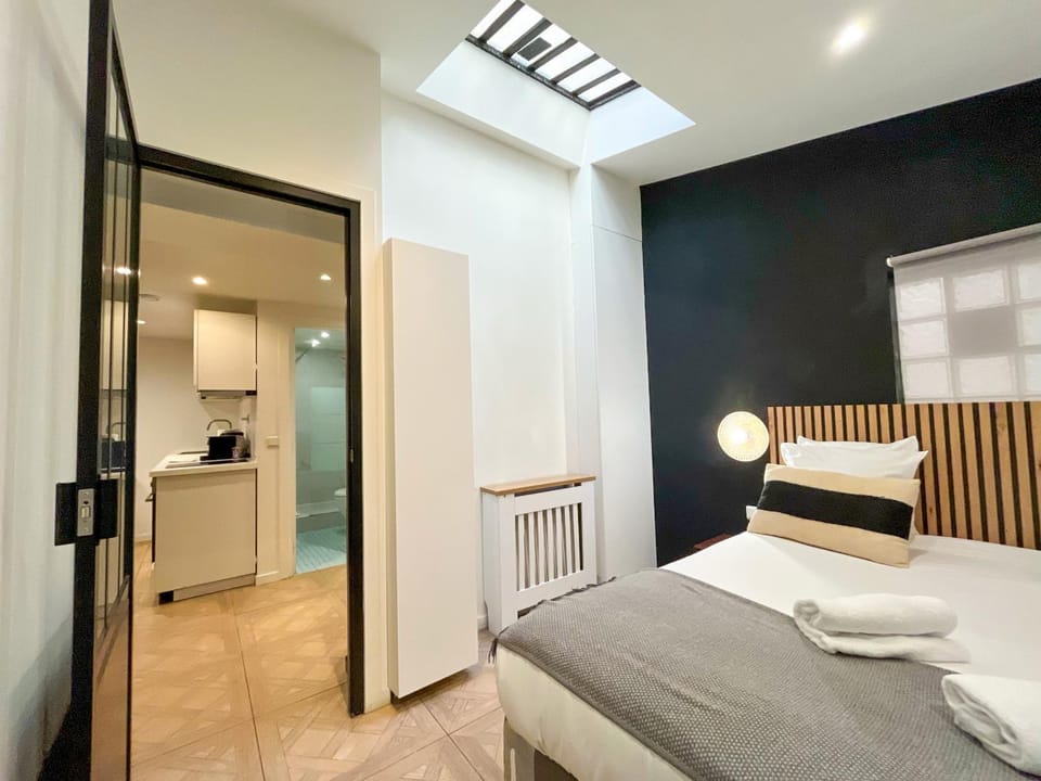 UrbanFlat 86 - Cocon Parisien de 2 Chambres Emplacement Ideal Apartment in Paris