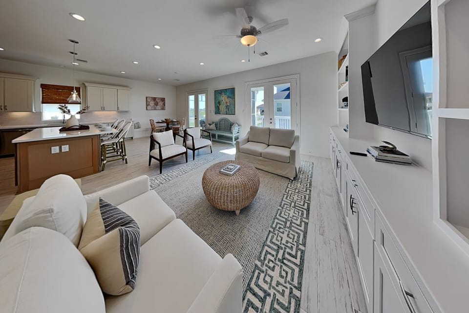 TV and multimedia, Kitchen or kitchenette, Living room, Seating area, Dining area, furniture, kitchen, air conditioner