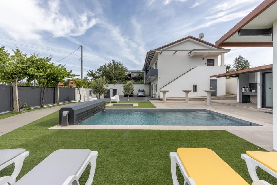 Property building, Living room, Swimming pool