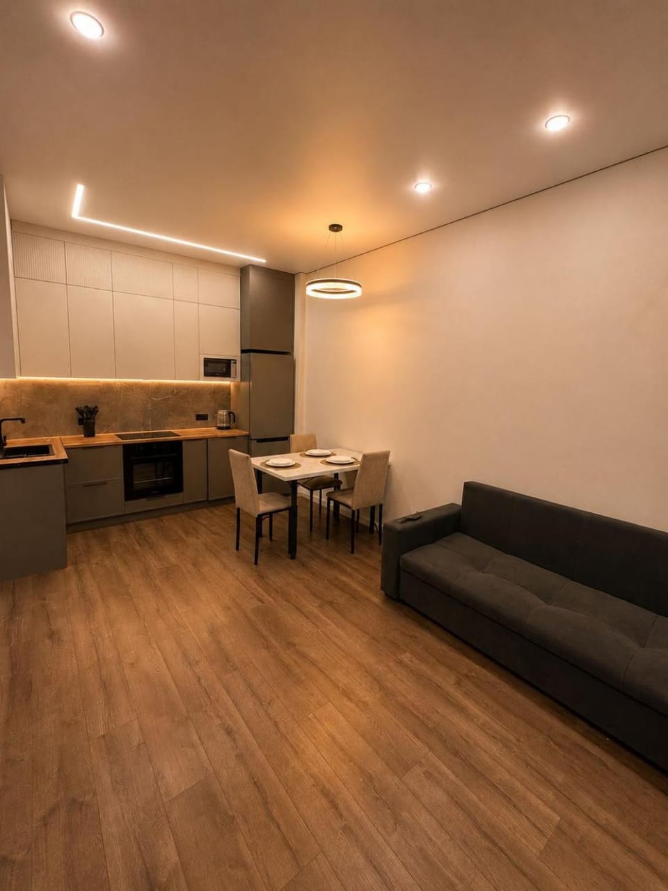 Kitchen or kitchenette, Living room, Seating area, Dining area
