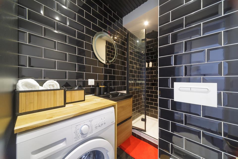 Shower, Toilet, hair dryier, towels, washing machine