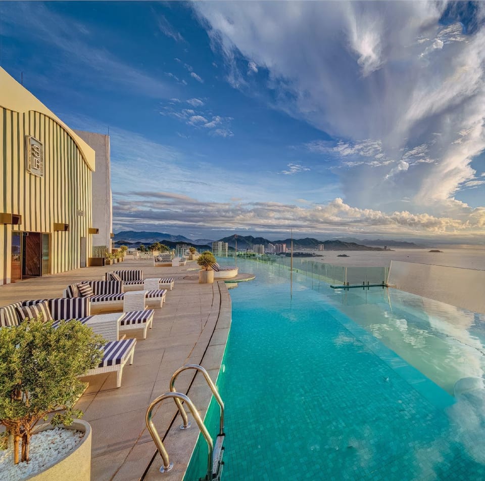 Property building, Patio, Day, Natural landscape, Pool view, Sea view, Swimming pool, Swimming pool, sunbed