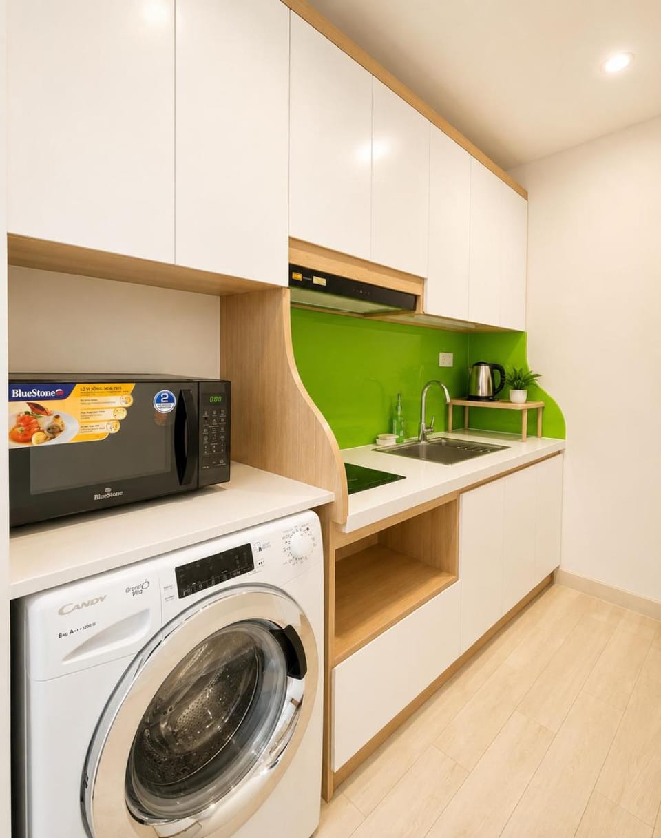 Kitchen or kitchenette, stove, washing machine