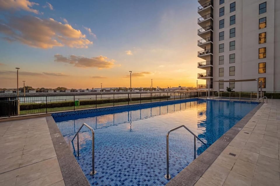 Property building, Day, Swimming pool, Sunrise, Sunset, sunbed
