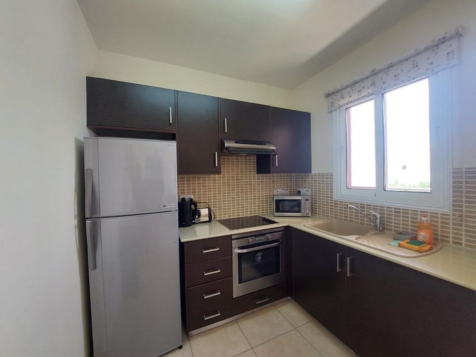 Kitchen or kitchenette, dishwasher, oven, stove, toaster