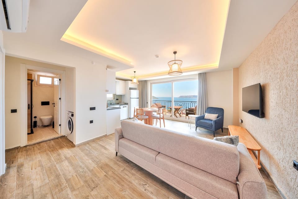 Communal lounge/ TV room, TV and multimedia, Kitchen or kitchenette, Living room, Seating area, Dining area, Sea view