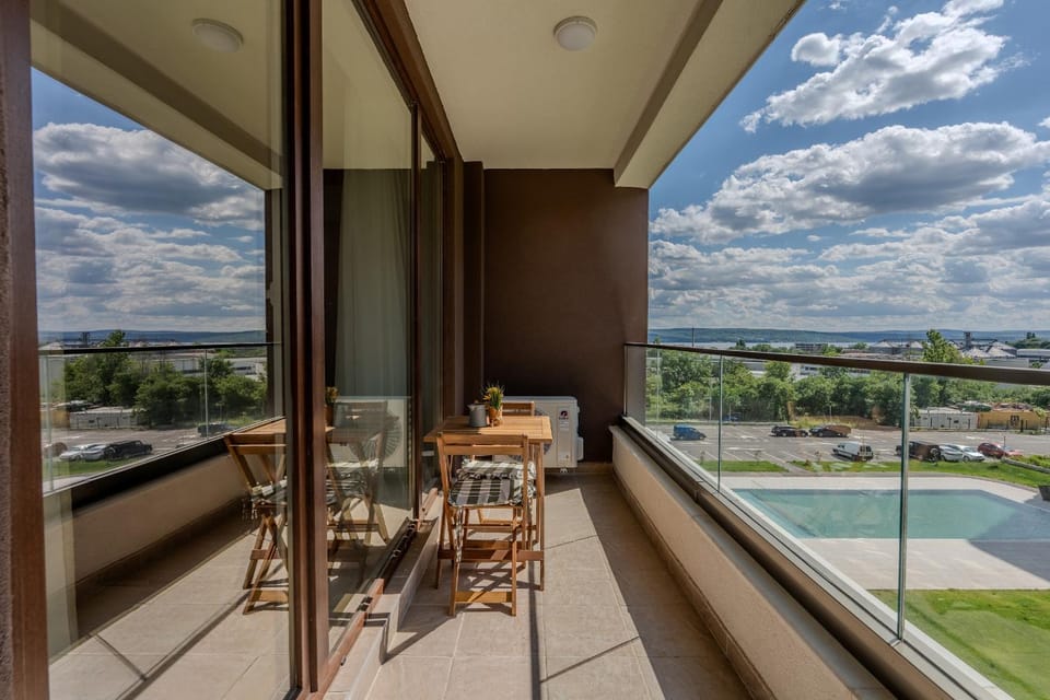 Balcony/Terrace, Seating area, Pool view, Swimming pool
