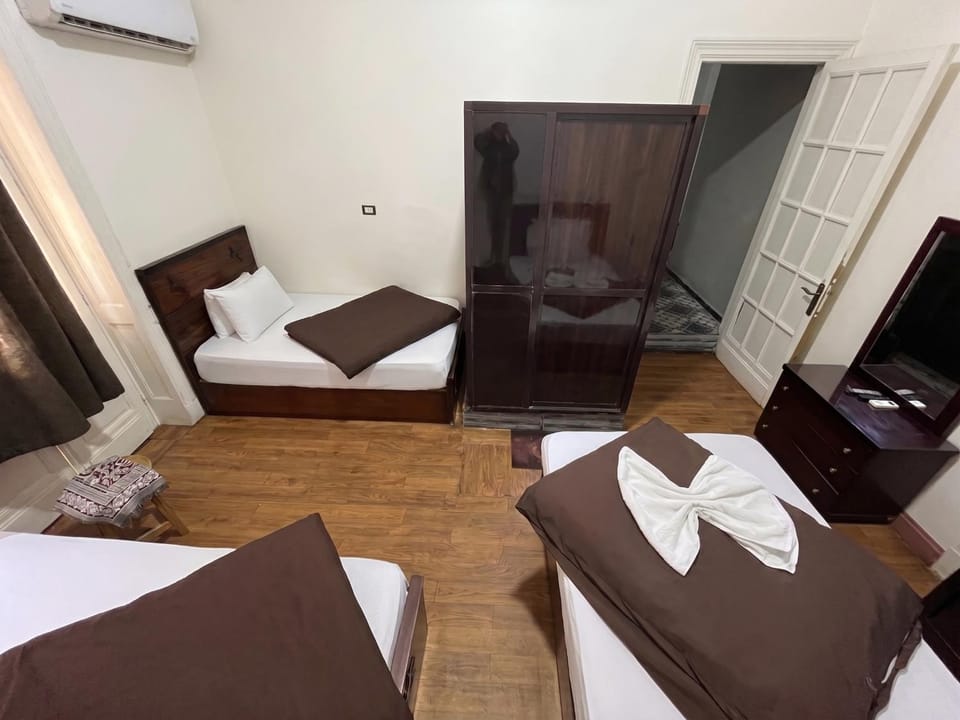 Bed, Photo of the whole room, Bedroom, towels, air conditioner