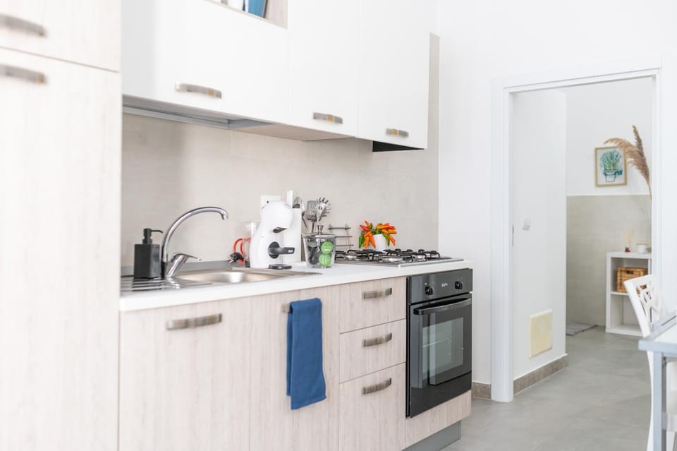 Kitchen or kitchenette, oven