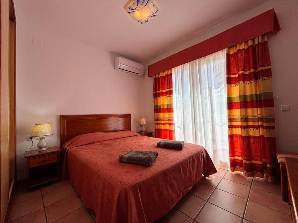Bed, Photo of the whole room, Bedroom, towels, air conditioner