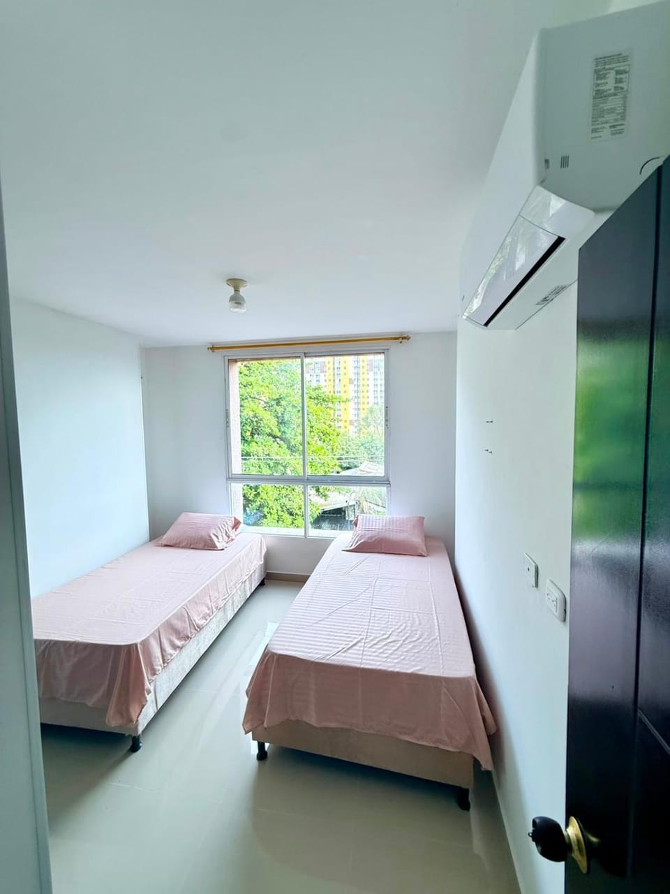 Bed, City view, Garden view, air conditioner