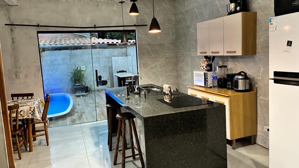 Piscina Privativa Churrasqueira 10 min da Praia Grande Loft da Naty House in Ubatuba