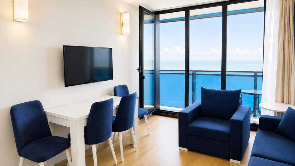 TV and multimedia, View (from property/room), Living room, Seating area, Dining area, Sea view