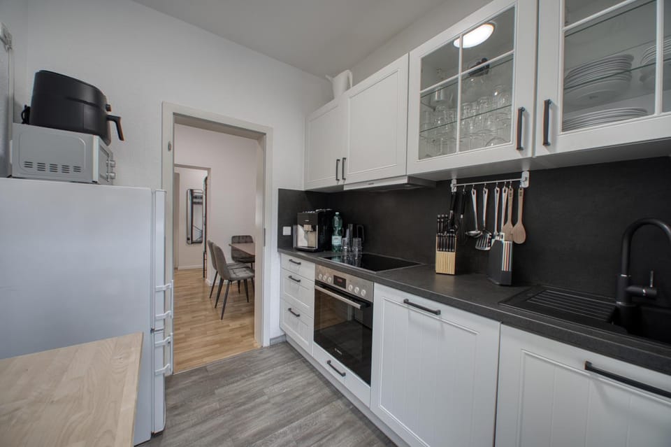 Kitchen or kitchenette, stove, kitchen
