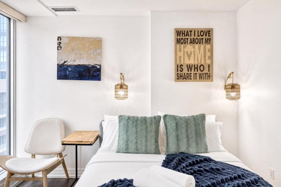 Bed, Living room, Seating area, Bedroom