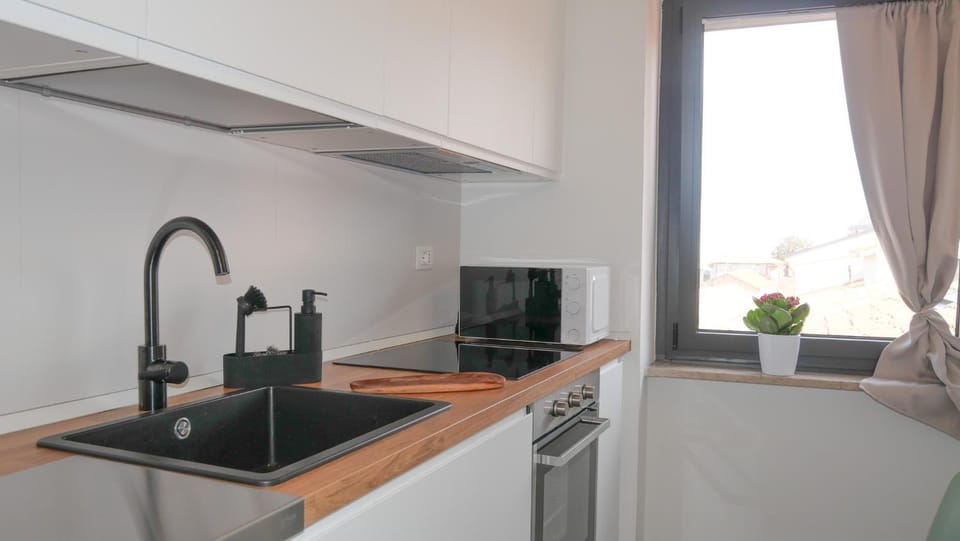Kitchen or kitchenette, stove