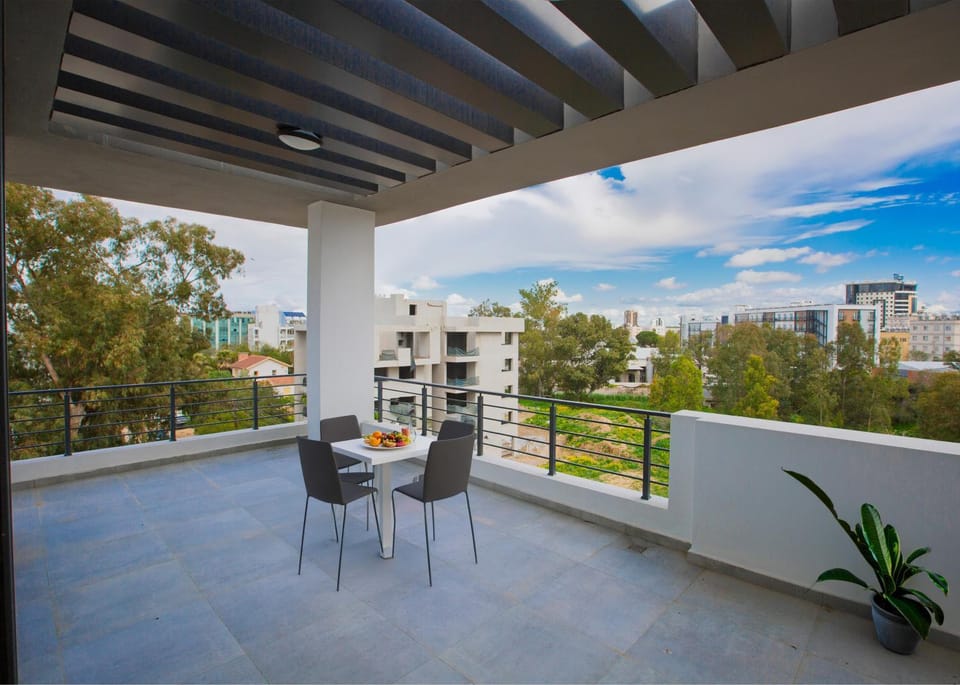Property building, Patio, Day, View (from property/room), Balcony/Terrace, Balcony/Terrace, Living room, Seating area, Dining area