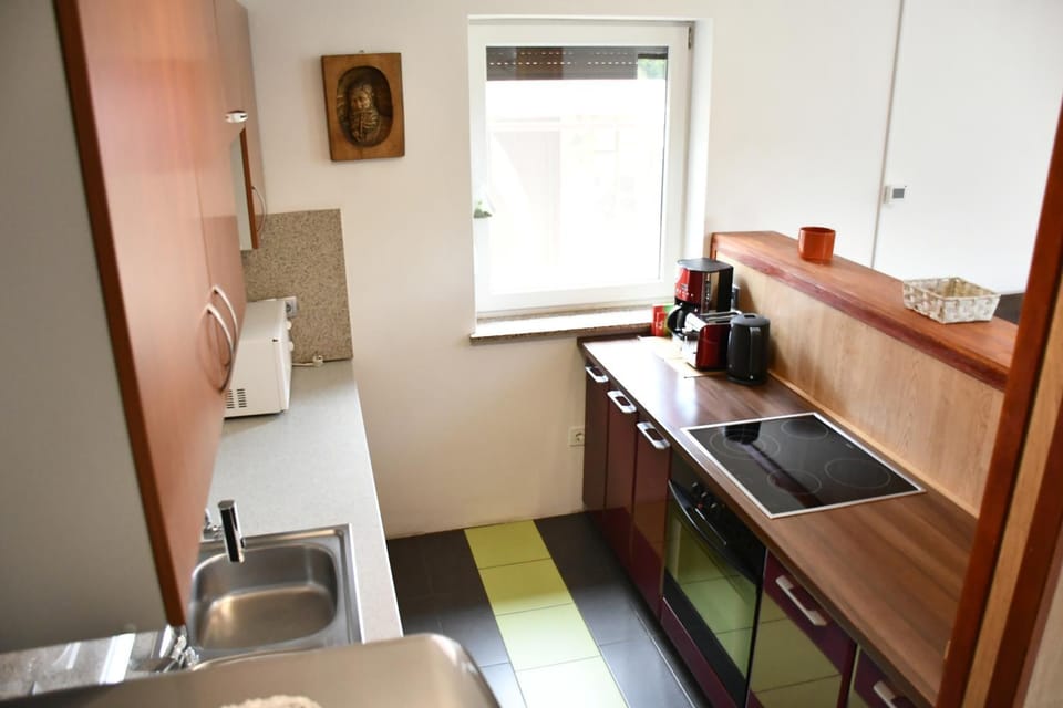 Kitchen or kitchenette, microwave, stove, kitchen