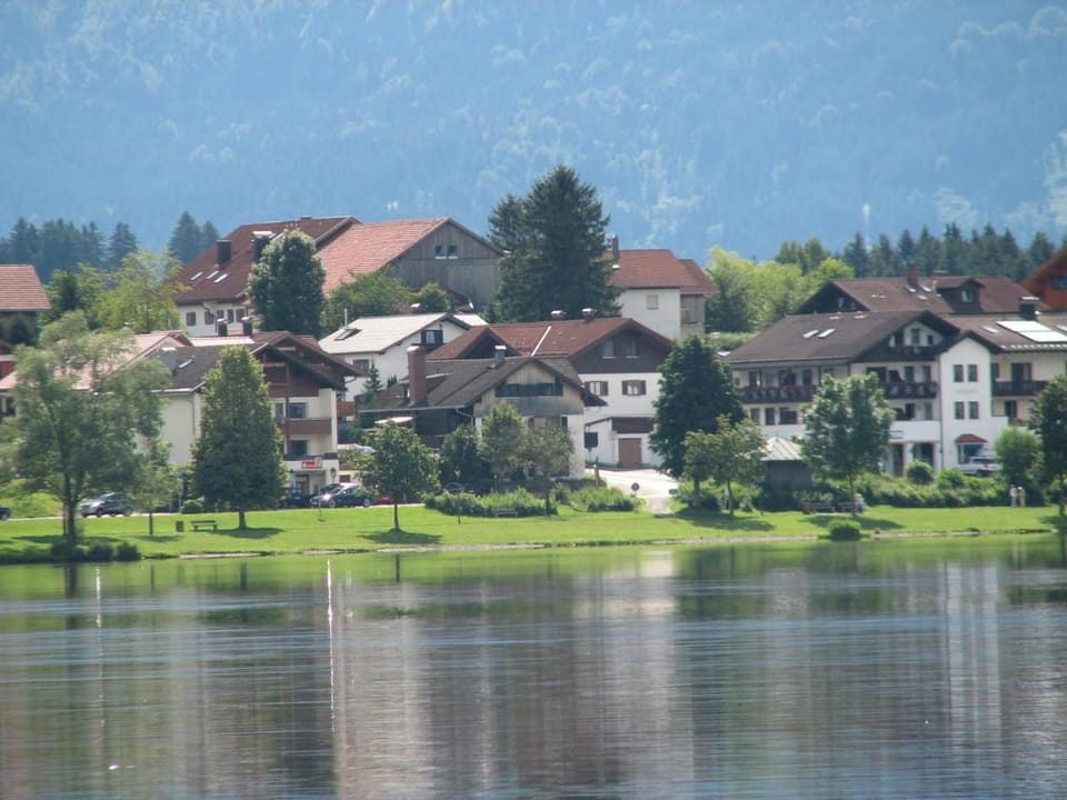 Property building, Natural landscape, Lake view, Mountain view