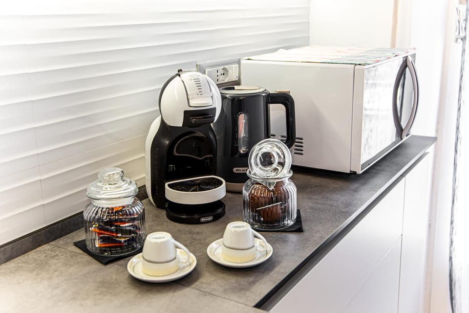 dishwasher, flat iron, microwave, kitchen