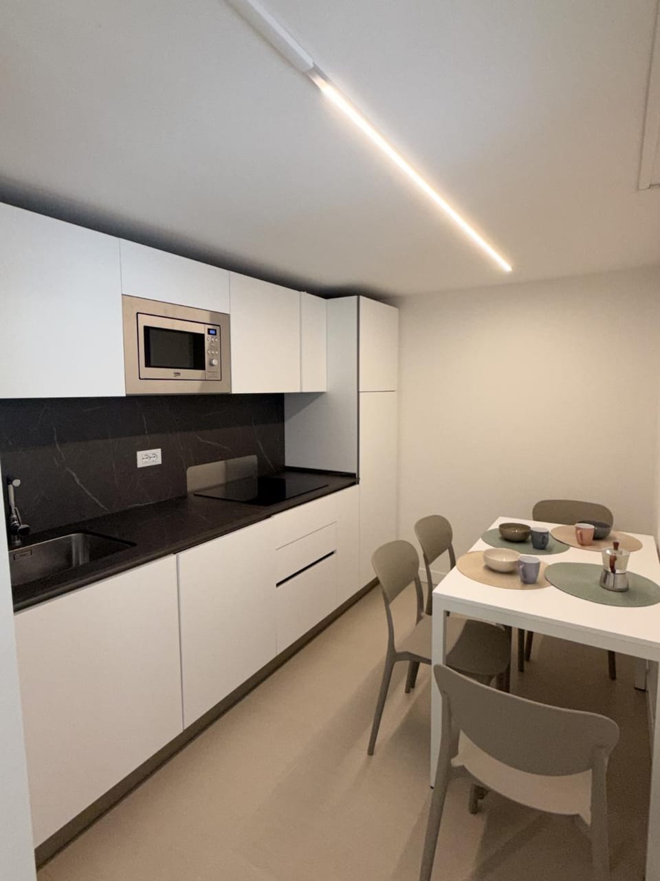Dining area, stove, kitchen