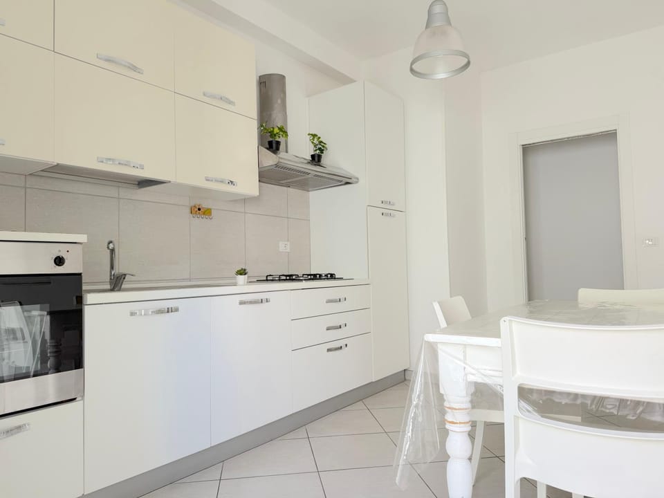 Kitchen or kitchenette, oven, stove