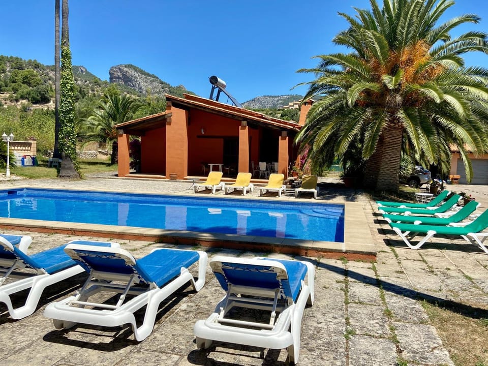 Property building, Living room, Swimming pool