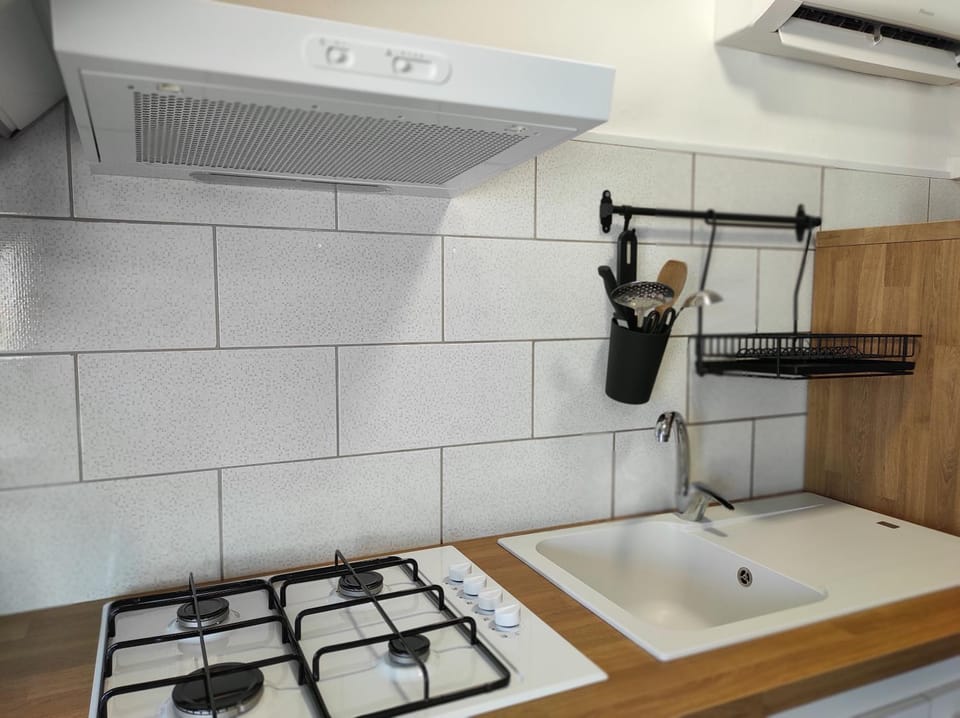 Kitchen or kitchenette, stove