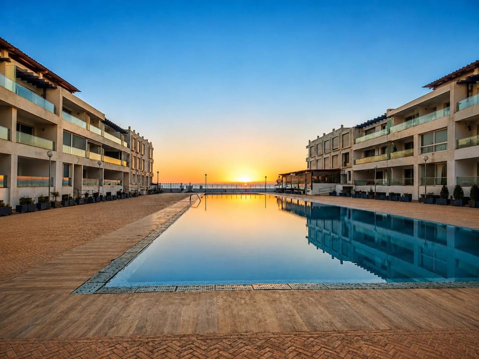 Property building, Natural landscape, Pool view, Swimming pool, Sunset