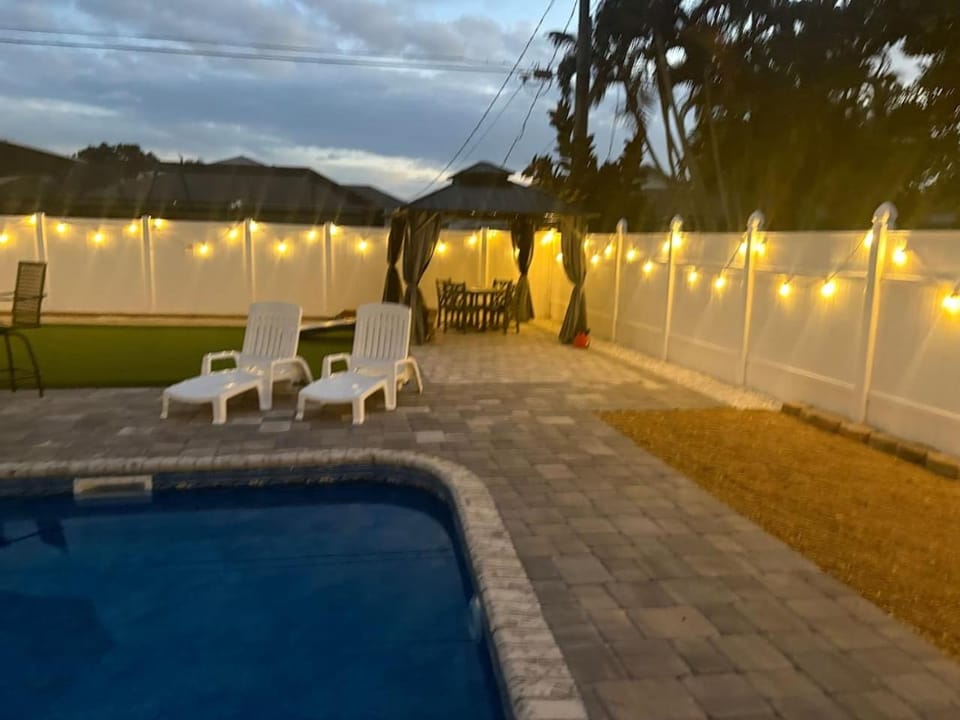 Night, Pool view, Swimming pool, sunbed