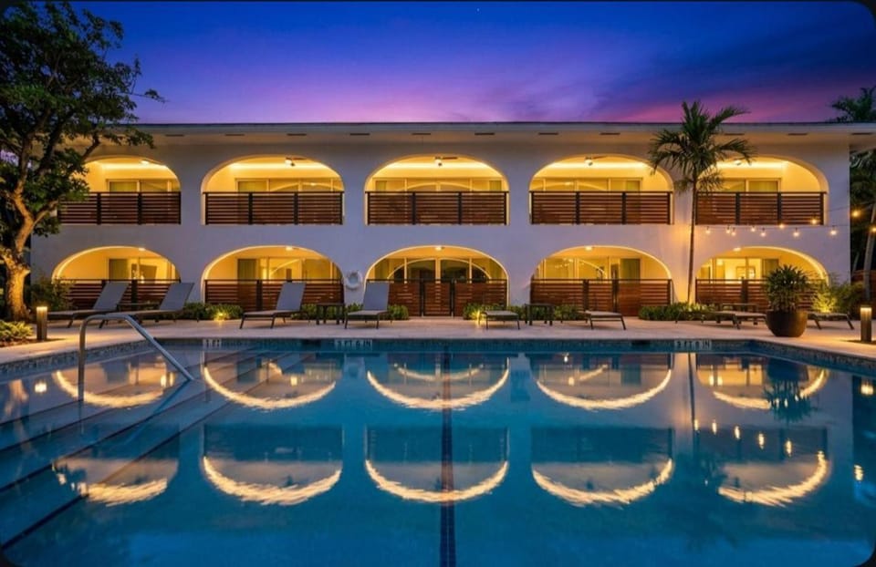 Property building, Night, Pool view, Swimming pool, sunbed