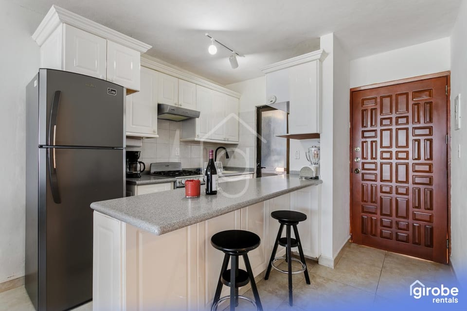 Kitchen or kitchenette, oven, stove