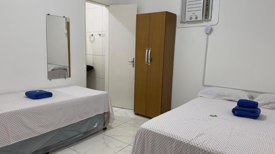 Bed, Photo of the whole room, Bedroom, towels, air conditioner