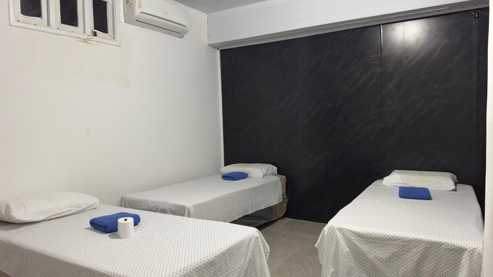 Bed, Photo of the whole room, Bedroom, towels, air conditioner