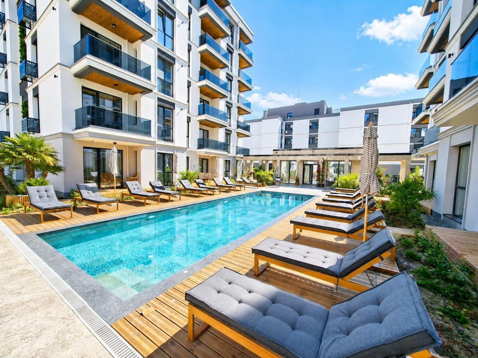Property building, Swimming pool, Swimming pool, sunbed