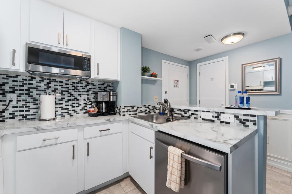 Kitchen or kitchenette, dishwasher, microwave