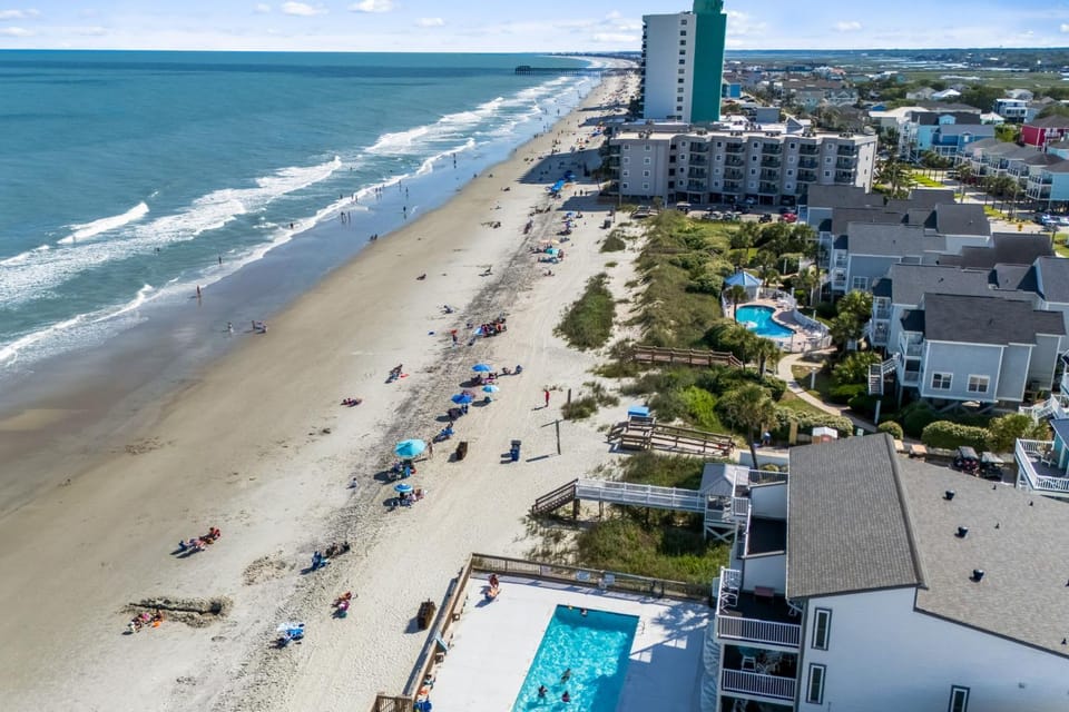 Coastal Retreat Steps 2 Beach Pool Views 1st Floor Apartment in Garden City