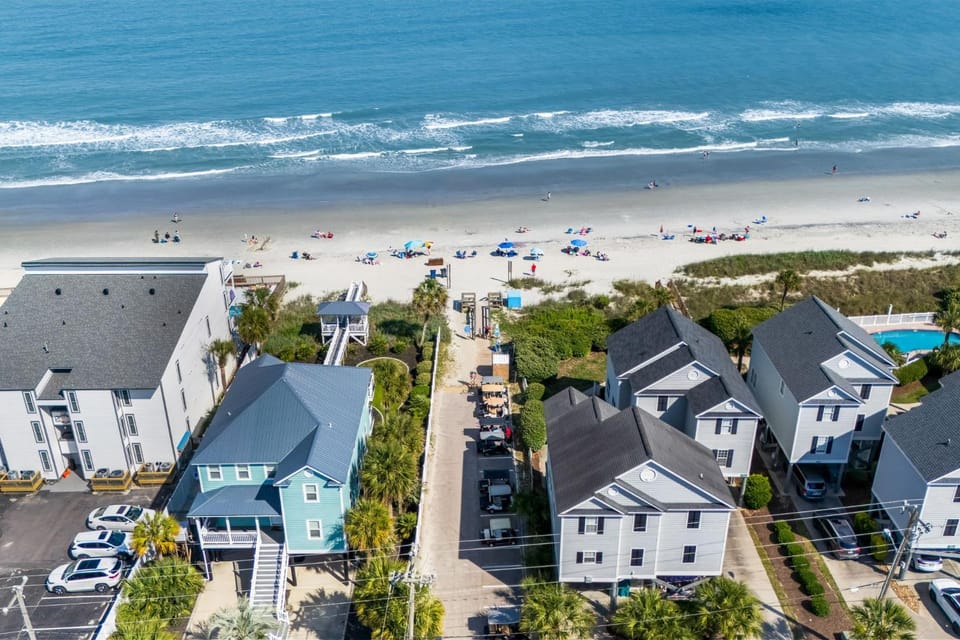 Coastal Retreat Steps 2 Beach Pool Views 1st Floor Apartment in Garden City