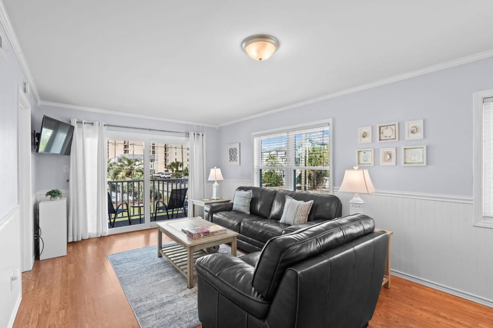 Coastal Retreat Steps 2 Beach Pool Views 1st Floor Apartment in Garden City